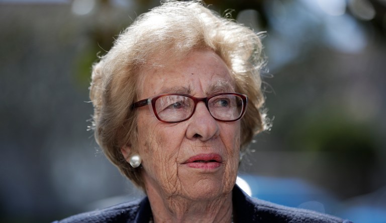Eva Schloss, the stepsister of Anne Frank and a Holocaust survivor, attends a news conference Thursday, March 7, 2019, in Newport Beach, Calif. Schloss met Thursday with Southern California high school students who were photographed giving Nazi salutes around a swastika formed by drinking cups at a party. Schloss said the students apologized for their behavior and indicated they didn't realize what it really meant.