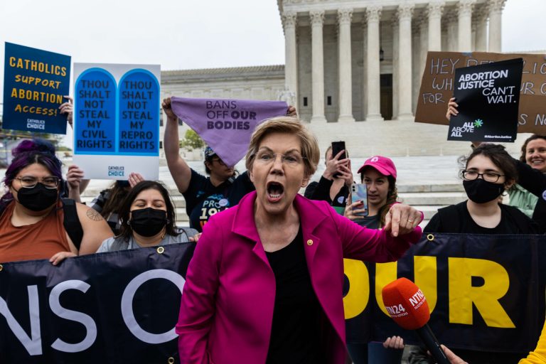 Sen. Elizabeth Warren joins abortion-rights protesters during a demonstration outside of the U.S. Supreme Court, May 2, 2022, in Washington. A draft opinion suggests the U.S. Supreme Court could be poised to overturn the landmark 1973 Roe v. Wade case that legalized abortion nationwide. 