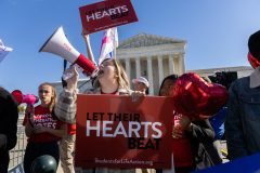 Advocates and opponents of Texas abortion law clash in Supreme Court hearing