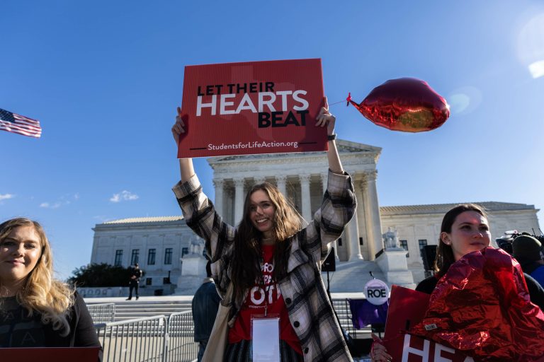 Pat Thompson displayed a sign supporting Roe v. Wade at a rally, held by Planned Parenthood, commemorating the 45th anniversary of the landmark Supreme Court decision at the Capitol Monday, Jan. 22, 2018, in Sacramento, Calif. The 1973 landmark decision by the United States Supreme Court affirmed a woman's right to have an abortion.