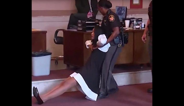 Former judge dragged out of court after being sentenced Former judge dragged out of court after being sentenced