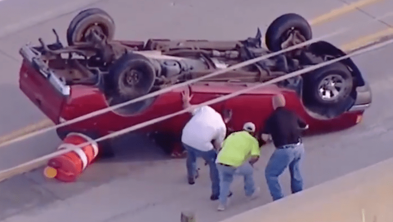 Group of strangers saves man in flipped truck