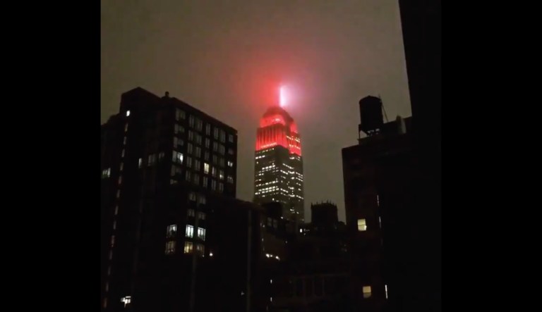 Empire State Building lit like ambulance siren to honor medical workers during coronavirus pandemic