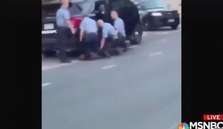 Second video of George Floyd arrest appears to show multiple officers kneeling on him