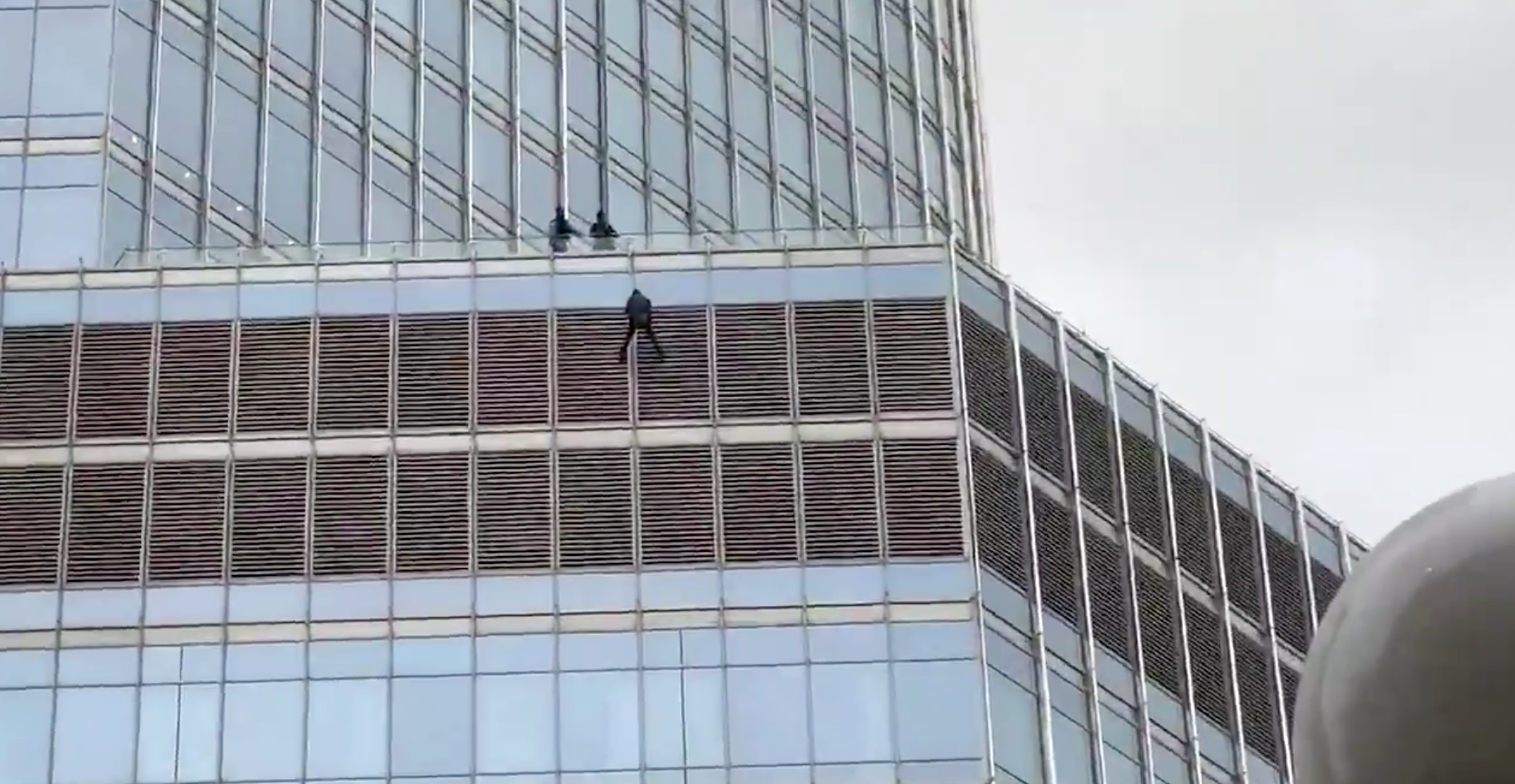Man hanging from Chicago Trump Tower for 13 hours demanding to speak to Trump taken into custody