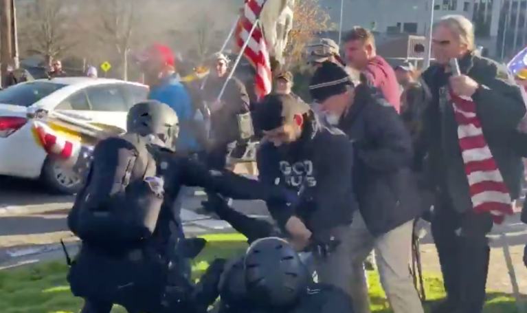 Videos show Trump supporters and counterprotesters in violent clash in Washington state