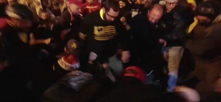 Video shows Proud Boys tackling counterprotester wielding a knife amid DC violence