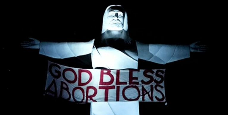 Activists hang ‘God Bless Abortions’ banner on massive Arkansas Jesus statue