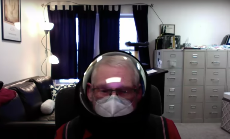 Fishbowl helmet-wearing professor placed on leave over profanity-laced rant about COVID-19