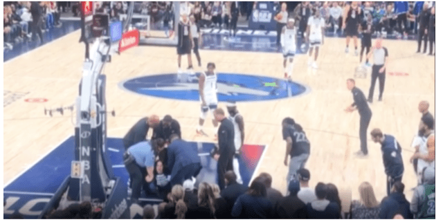 Protester attempts to glue herself onto court during NBA game