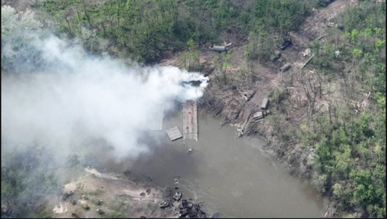 Ukrainian forces blow up two makeshift Russian bridges in Ukraine, drone images show