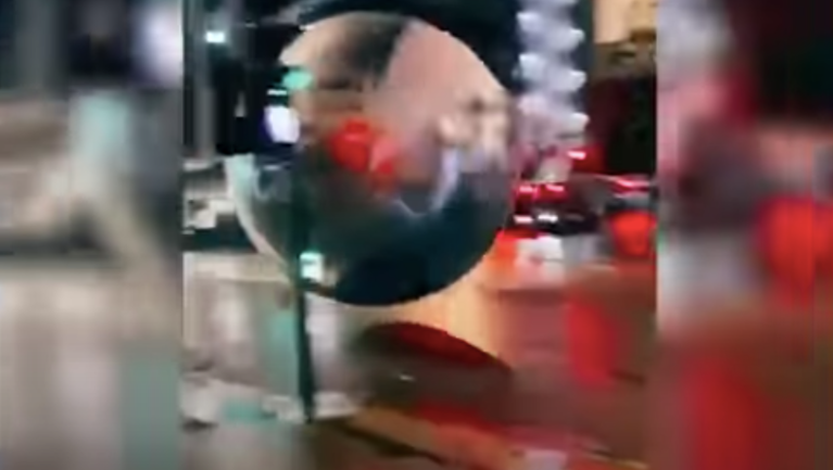 WATCH: Giant Christmas ornaments unleash chaos on London streets