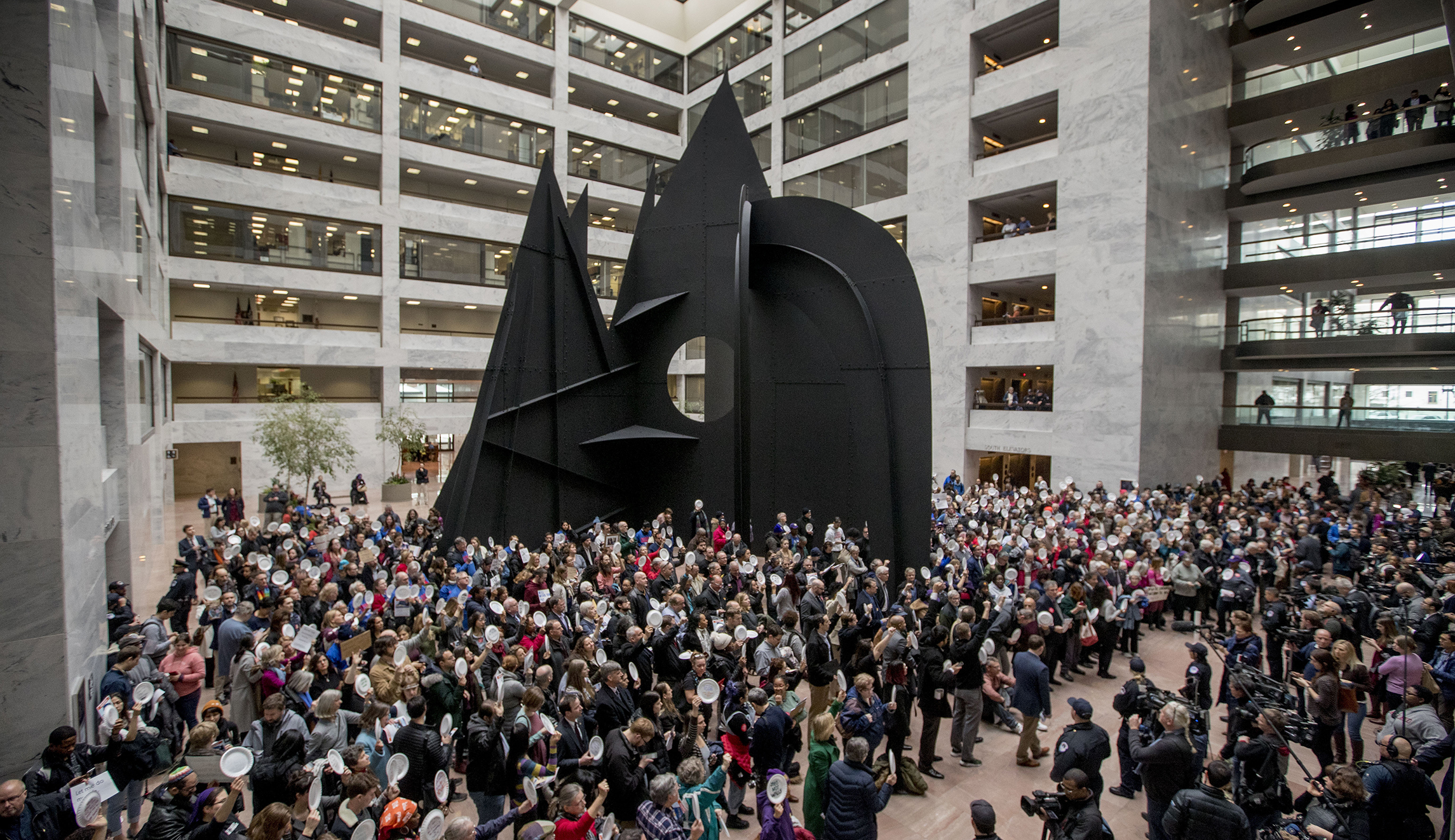 Furloughed federal employees stage sit-in at Senate offices