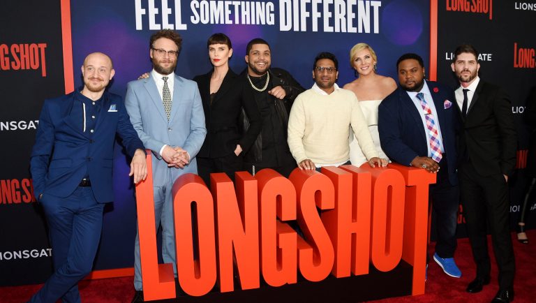 Actors Anton Koval, left, Seth Rogen, Charlize Theron, O'Shea Jackson Jr, Ravi Patel, June Diane Raphael, Tristan D. Lalla and director Jonathan Levine pose together at the premiere of "Long Shot" at AMC Loews Lincoln Square on Tuesday, April 30, 2019, in New York. 