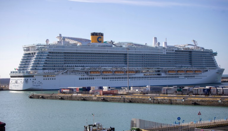 The Costa Smeralda cruise ship is docked in the Civitavecchia port near Rome, Thursday, Jan. 30, 2020. Italian health authorities are keeping some 7,000 people aboard after a passenger from Macao came down with flu-like symptoms, amid the global scare about a new virus. Passengers are being kept on board pending check to determine the type of virus.