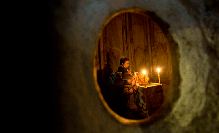 Members of the faithful visit the renovated edicule in the Church of the Holy Sepulchre, traditionally believed to be the site of the crucifixion of Jesus Christ, in Jerusalem on Mar. 20, 2017.