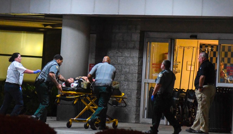 Soldiers from the 4th Brigade of the 25th Infantry Division stationed at the Joint Base Elmendorf-Richardson in Anchorage, Alaska, are brought to Forrest General Hospital in Hattiesburg, Miss., Wednesday, night, Oct. 2, 2019, after a training operation at Camp Shelby went wrong.  The injured paratroopers were among 650 soldiers jumping from C-130 planes Wednesday night. Some were blown off course from their intended landing and ended up into a stand of pine trees. (Cam Bonelli/The Hattiesburg American, via AP)