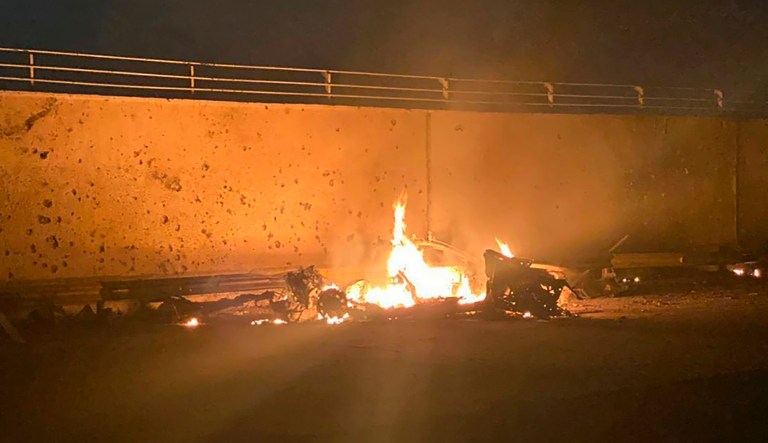 This photo released by the Iraqi Prime Minister Press Office shows a burning vehicle at the Baghdad International Airport following an airstrike, in Baghdad, Iraq, early Friday, Jan. 3, 2020. The Pentagon said Thursday that the U.S. military has killed Gen. Qassem Soleimani, the head of Iran's elite Quds Force, at the direction of President Donald Trump.