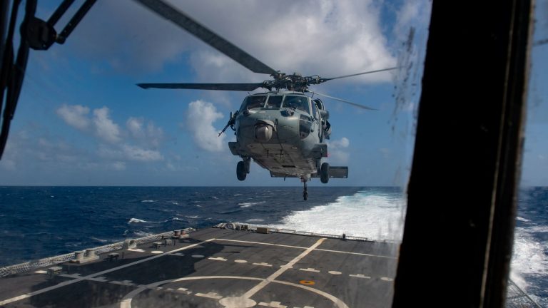 An MH-60S Sea Hawk takes off from flight deck of the Freedom-class littoral combat ship USS Little Rock deployed to support Campaign Martillo targeting counter illicit drug operations in the Caribbean Sea February 16, 2020.