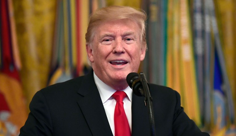FILE - In this Sept. 12, 2018, file photo, President Donald Trump speaks during a Congressional Medal of Honor Society Reception in the East Room of the White House in Washington. Top Florida Republicans have been quick to say Trump is wrong about the death toll in Puerto Rico.