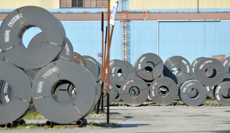 Rolls of steel weighing as much as 20 tons each await shipment the NUCOR Steel Gallatin plant, Wednesday, July 25, 2018, in Ghent, Ky. The plant is operating 24 hours a day to meet demand.