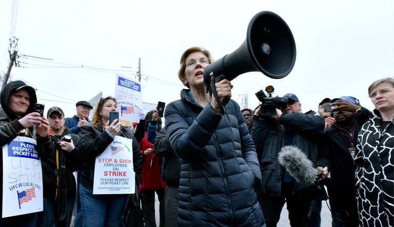 Democratic Presidential hopeful, Sen. Elizabeth Warren, D-Mass., addresses striking Stop & Shop supermarket employees on the picket line on Friday, April 12, 2019, in Somerville, Mass. Unionized workers in three states walked off the job on Thursday over stalled contract negotiations.
