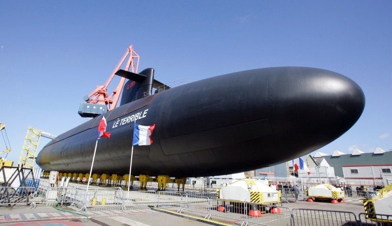 Police technicians board submarine UC3 Nautilus on a pier in Copenhagen harbor, Denmark, Sunday, August 13, 2017, to conduct forensic probes in connection with a murder investigation involving a missing Swedish journalist.