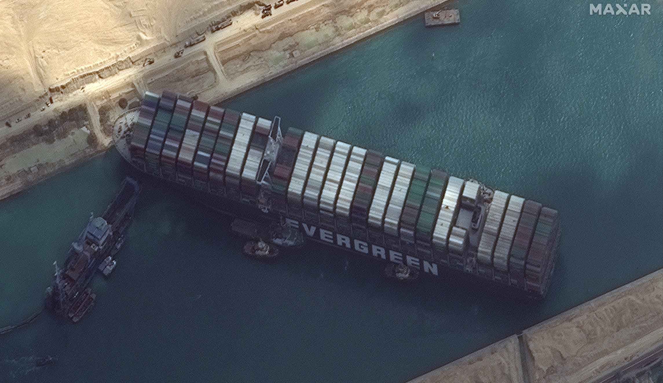 Egyptian official says stuck cargo ship will be out of Suez Canal by end of weekend