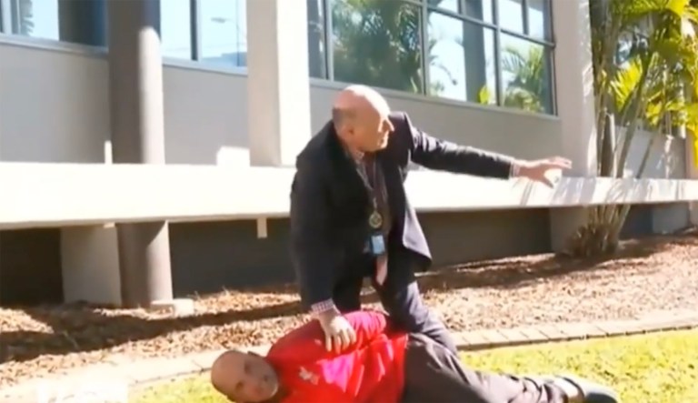 Detective stops press conference to tackle suspect