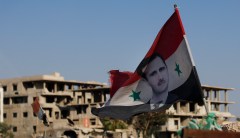 Trump signs law authorizing Congress’ review of his Syria strategy