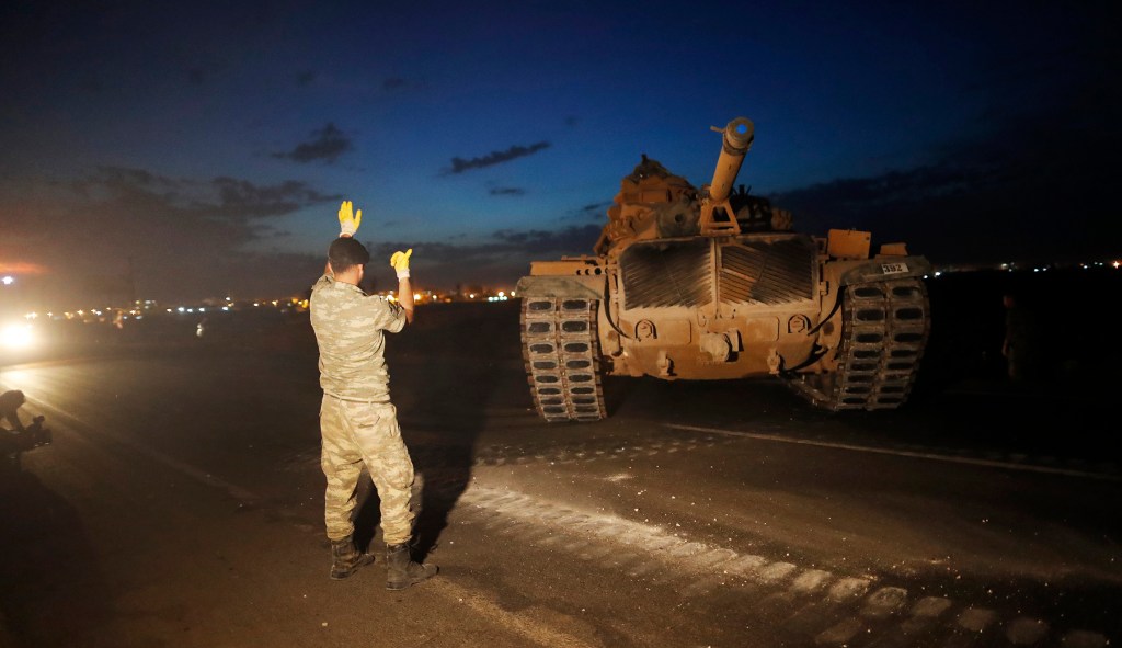 Turkish tanks mass on Syrian border in preparation for assault on Kurds