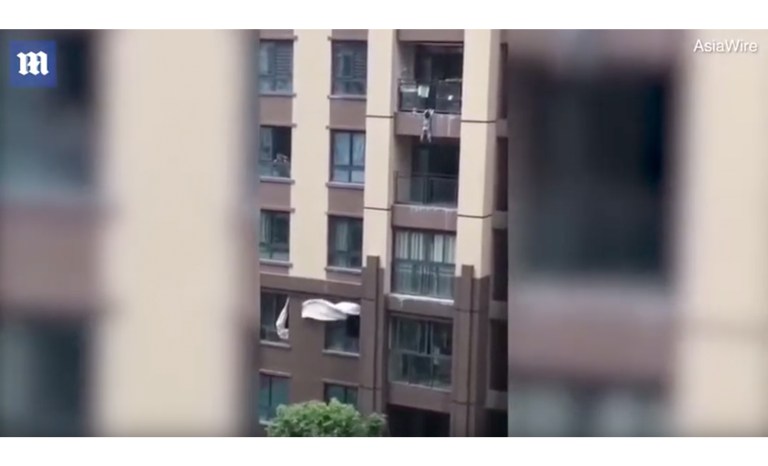 WATCH: Toddler falls from six stories, caught by neighbors below