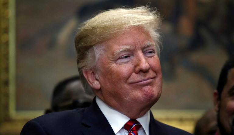President Donald Trump attends a ceremony where he signed an executive order establishing the White House Opportunity and Revitalization Council, in the Roosevelt Room of the White House, Wednesday Dec. 12, 2018, in Washington. 