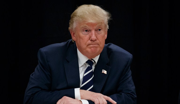 Republican presidential candidate Donald Trump meets with community leaders and addiction specialists, Friday, Oct. 28, 2016, in Manchester, N.H.
