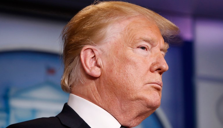 President Donald Trump listens to members of the Border Patrol speak about border security, Thursday Jan. 3, 2019, during a surprise appearance in the briefing room of the White House in Washington.