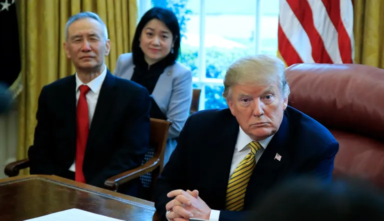 President Donald Trump speaks to reporters during a meeting with China's Vice Premier Liu He in the Oval Office of the White House in Washington, Thursday, April 4, 2019.