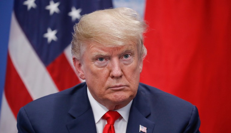 President Donald Trump listens to Japan's Prime Minister Shinzo Abe speak during their meeting, Friday, Nov. 30, 2018 in Buenos Aires, Argentina.