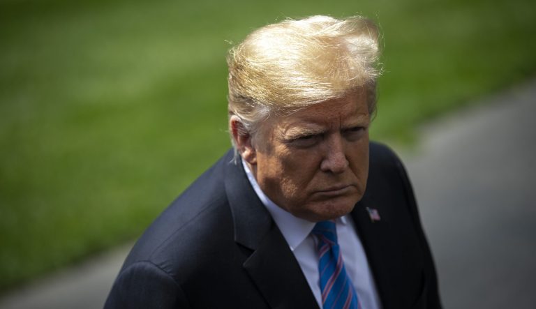President Trump listens to a question from a member of the media before boarding Marine One on the South Lawn of the White House in Washington, D.C., on Tuesday, May 14, 2019.