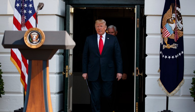 President Donald Trump arrives to deliver remarks about the economy on the South Lawn of the White House, Friday, July 27, 2018, in Washington.