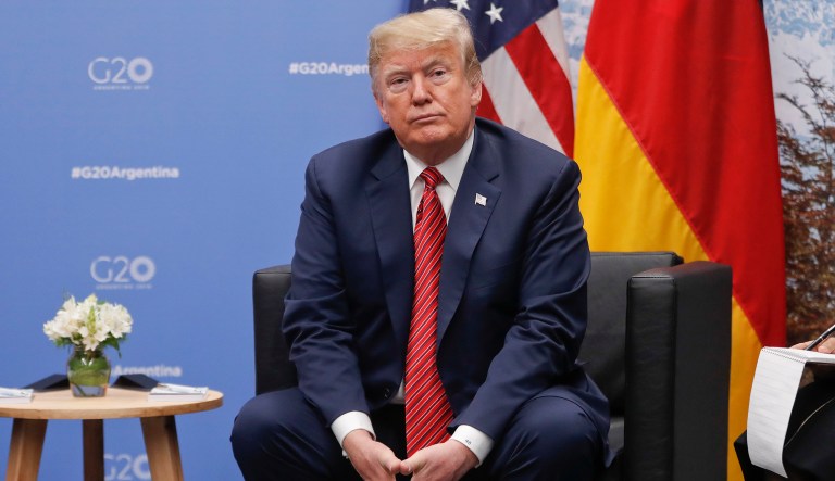 President Donald Trump listens to questions from members of the media during his meeting with Germany's Chancellor Angela Merkel at the G20 Summit, Saturday, Dec. 1, 2018 in Buenos Aires, Argentina.