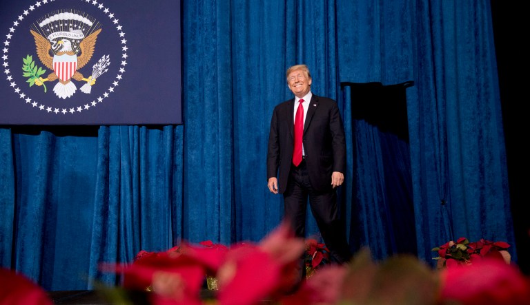 President Donald Trump takes the stage to speak the 2018 Project Safe Neighborhoods National Conference at the Westin Kansas City at Crown Center in Kansas City, Mo., Friday, Dec. 7, 2018.