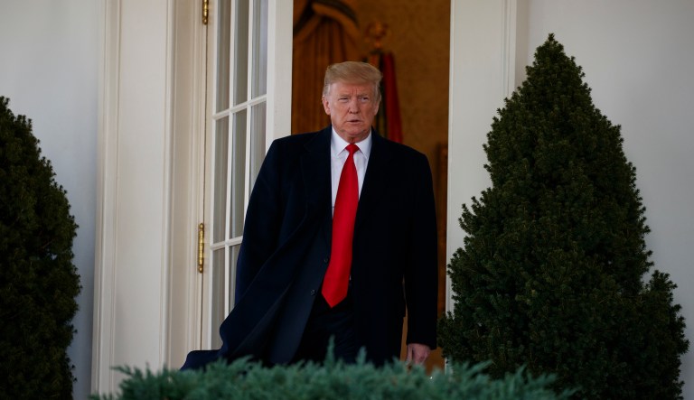 President Donald Trump walks out of the Oval Office to announce a deal to temporarily reopen the government, in the Rose Garden of the White House, Friday, Jan. 25, 2019, in Washington.