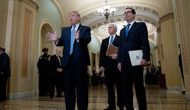 President Trump and Treasury Secretary Steve Mnuchin arrive on Capitol Hill to address GOP lawmakers on March 10, 2020
