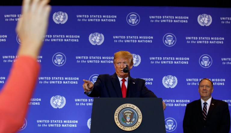 Secretary of State Mike Pompeo listens as President Donald Trump speaks during a news conference at the InterContinental Barclay New York hotel during the United Nations General Assembly, Wednesday, Sept. 25, 2019, in New York.