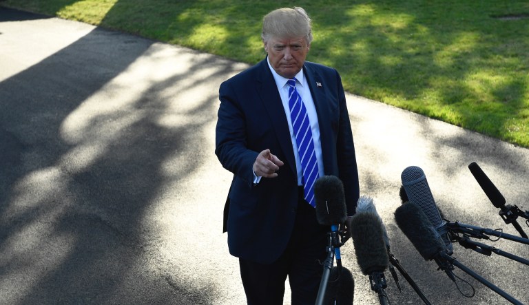 President Donald Trump talks to reporters on the South Lawn of the White House in Washington, Friday, Aug. 30, 2019, before heading to Camp David for the weekend. 