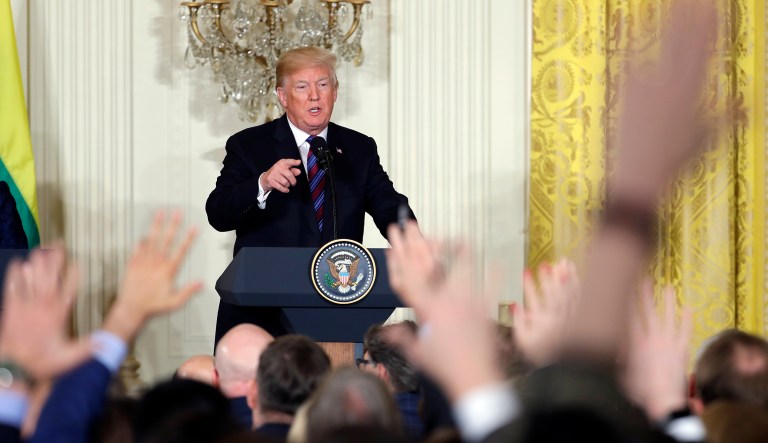 President Donald Trump motions to reporters waiting to ask questions during a news conference with Latvian President Raimonds Vejonis, Estonian President Kersti Kaljulaid, and Lithuanian President Dalia Grybauskaite in the East Room of the White House, Tuesday, April 3, 2018, in Washington.