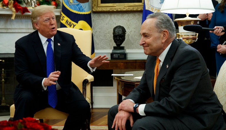 President Donald Trump speaks to Senate Minority Leader Chuck Schumer, D-N.Y., during a meeting with Democratic leadership in the Oval Office of the White House, Tuesday, Dec. 11, 2018, in Washington.
