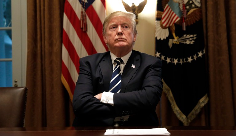 U.S. President Donald Trump listens during a meeting with members of Congress in the Cabinet Room of the White House in Washington, D.C., U.S., on Thursday, July 17, 2018. TrumpÂ said Tuesday he accepts the conclusion by U.S. intelligence agencies that Russia interfered in the U.S. presidential election, marking a rare reversal from comments just a day earlier.