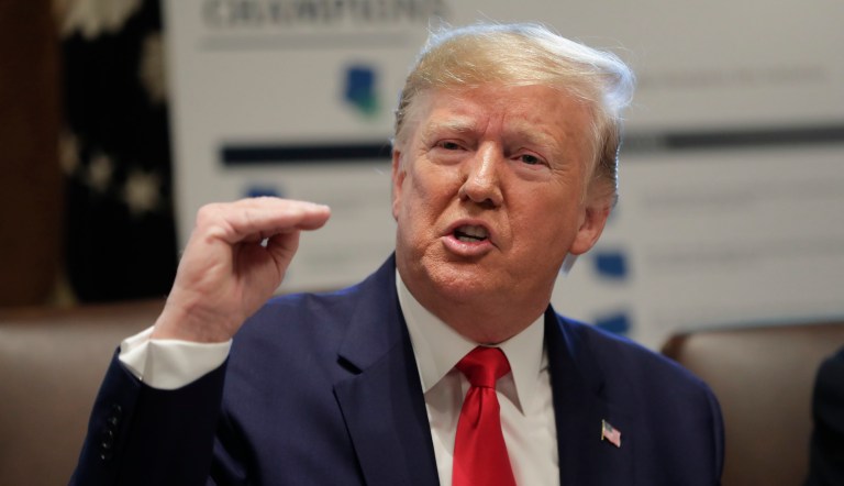 In this Oct. 21, 2019 photo, President Trump speaks during a Cabinet meeting in the Cabinet Room of the White House. 