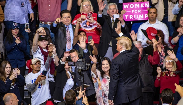 U.S. President Donald Trump waves to the audience during a campaign rally with Senator Ted Cruz, a Republican from Texas, not pictured, in Houston, Texas, U.S., on Monday, Oct. 22, 2018. TrumpÂ declared that he's a "nationalist" at the rally as he appealed to Texas Republicans to re-elect CruzÂ and help the party keep control of Congress.